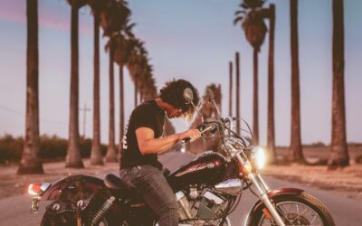 man riding on motorcycle