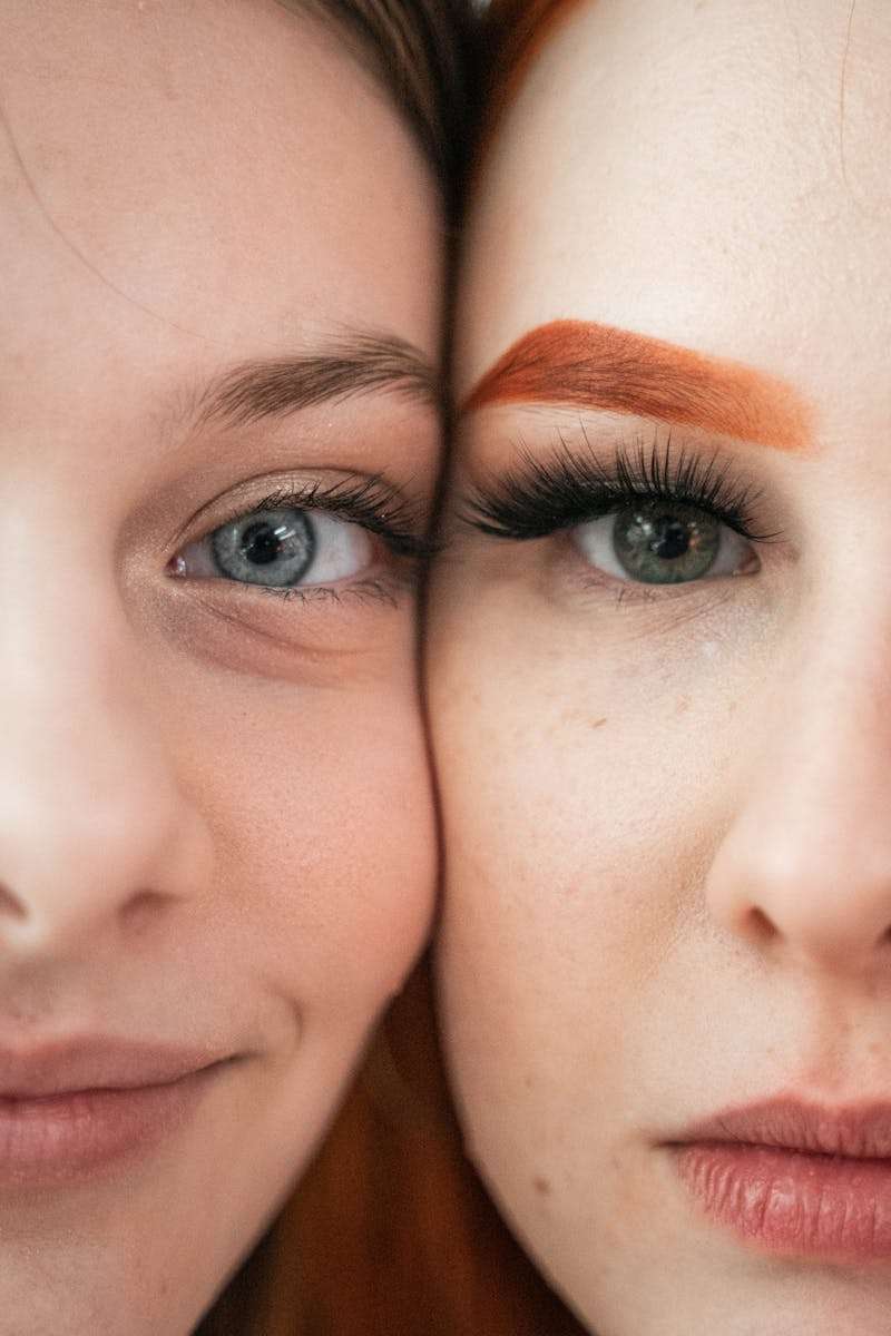 A Close-up Shot of Women's Face Together