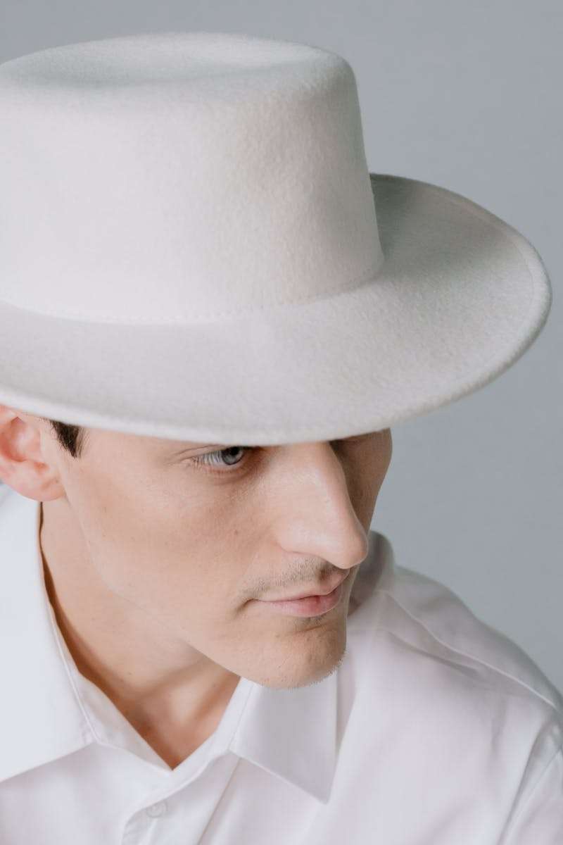 Man Wearing a White Hat