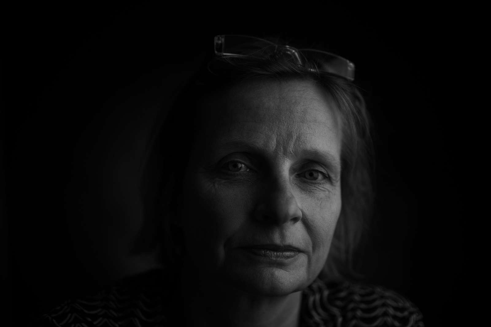 woman in black and white shirt